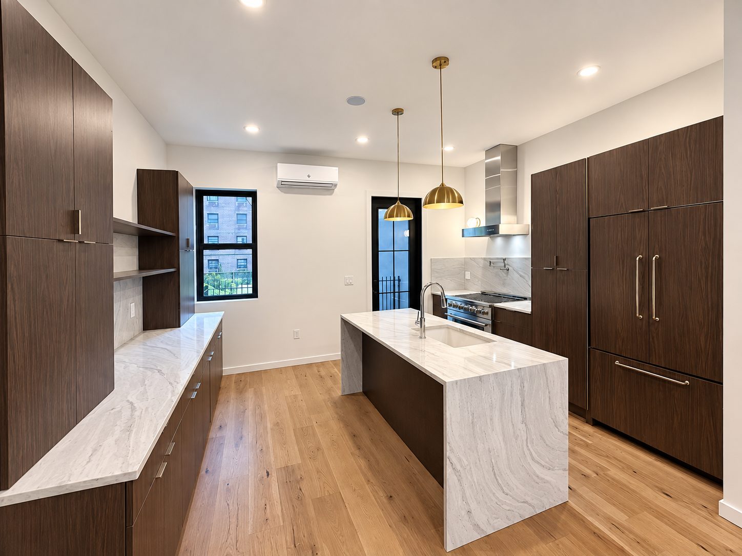 Dark espresso kitchen with two islands